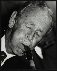 Spike Robinson playing tenor saxophone at The Fairway, Welwyn Garden City, Hertfordshire, 1992. Artist: Denis Williams