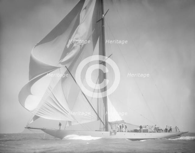 Spinnaker flying on unknown yacht. Creator: Kirk & Sons of Cowes.
