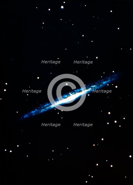 Spiral galaxy viewed edge on. Artist: Unknown