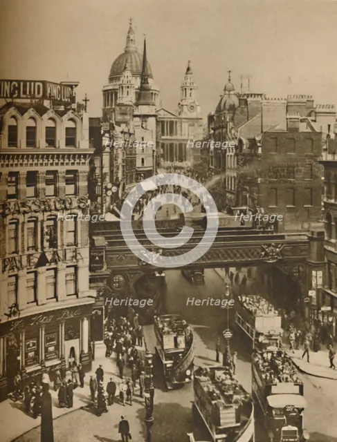 'Spire of St. Martin's Ludgate Silhouetted Against The Bulk of St. Paul's', c1935. Creator: Unknown.