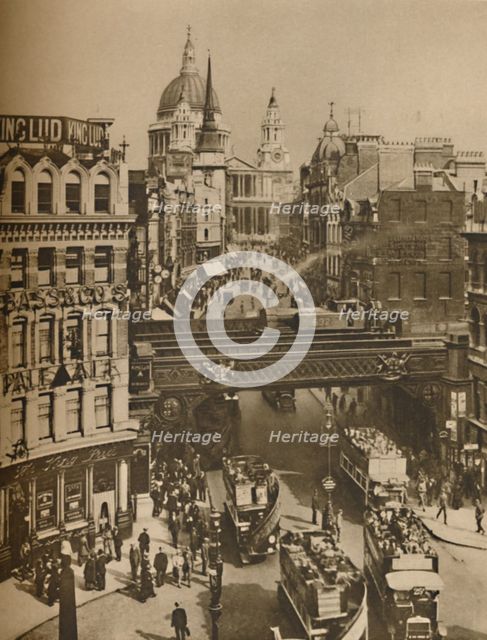'Spire of St. Martin's Ludgate Silhouetted Against The Bulk of St. Paul's', c1935. Creator: Unknown.