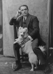 Spirescu, Steraskon, Mr., with dog, portrait photograph, 1917 Mar. 1. Creator: Arnold Genthe