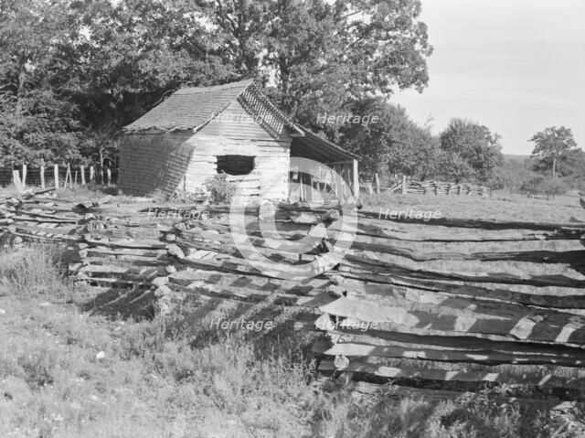 Split-log fence, North Central Arkansas along U.S. 62, 1938. Creator: Dorothea Lange.