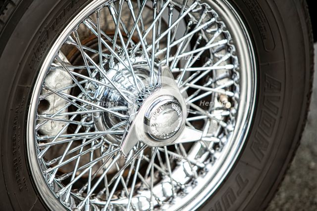 Spoked wheel of a 1965 Aston Martin DB5. Creator: Unknown.
