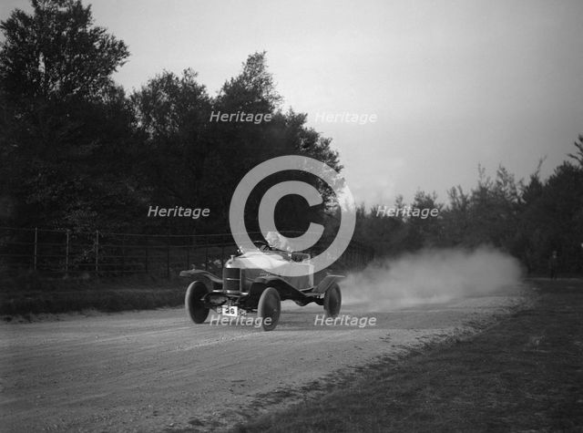 Sports-bodied Morris 2-seater fitted with wheel discs. Artist: Bill Brunell.