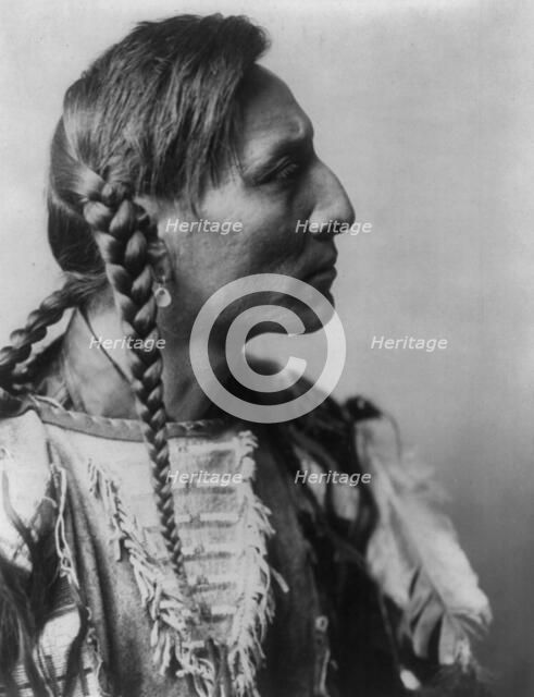 Spotted Bull-Mandan, c1908. Creator: Edward Sheriff Curtis.