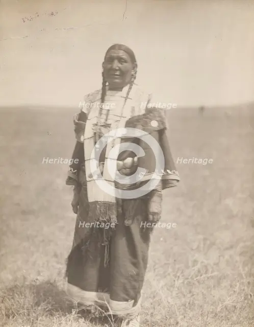 Spotted Eagle's wife, 1907. Creator: Edward Sheriff Curtis.