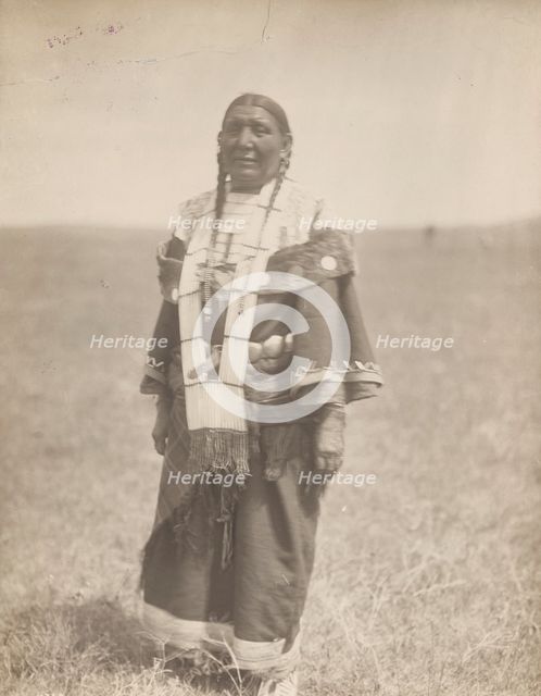 Spotted Eagle's wife, 1907. Creator: Edward Sheriff Curtis.