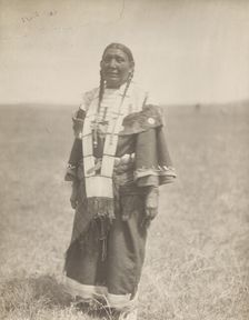 Spotted Eagle's wife, 1907. Creator: Edward Sheriff Curtis