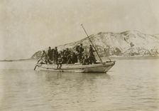 Squad of sappers and miners coming ashore in a sampan at Chemulpo, c1904. Creator: Robert Lee Dunn