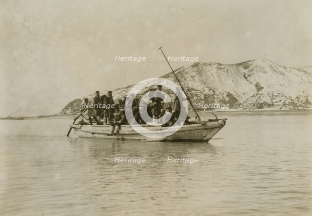 Squad of sappers and miners coming ashore in a sampan at Chemulpo, c1904. Creator: Robert Lee Dunn.