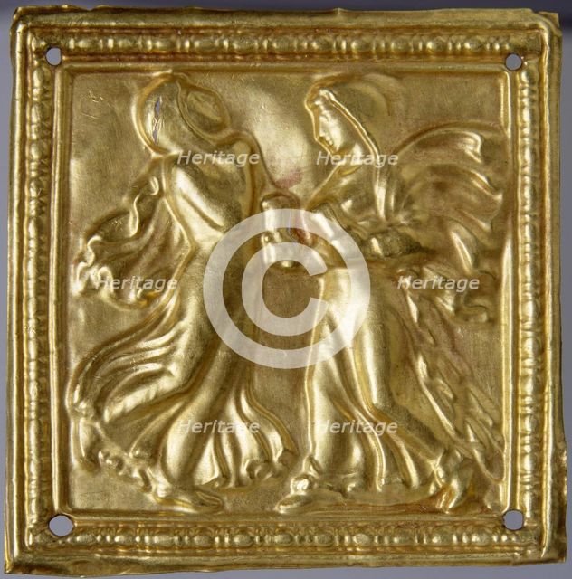 Square plaque with dancers.