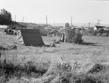 Squatter camp entering potato town, Malin, Klamath County, Oregon, 1939. Creator: Dorothea Lange