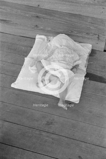 Squeakie asleep (Othel Lee Burroughs), Child of a Hale County, Alabama cotton..., 1936. Creator: Walker Evans.