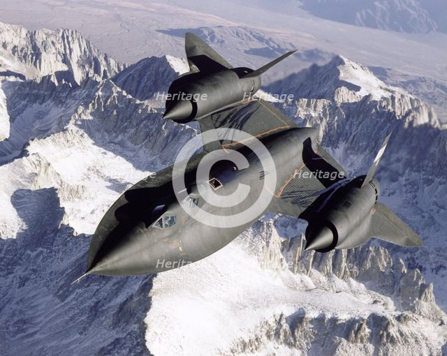 SR-71 over snow-capped mountains, USA, 1995.  Creator: NASA.