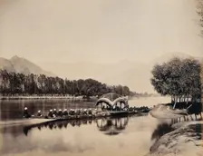 Srinagar, Kashmir: a large rowing boat proceeding along an inland waterway, c1870s. Creator: Samuel Bourne