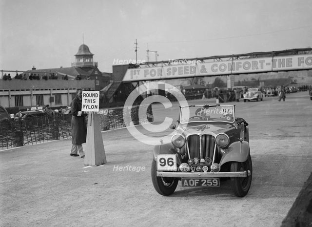 SS 2 competing in the JCC Rally, Brooklands, Surrey, 1939. Artist: Bill Brunell.