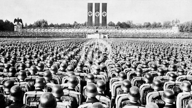 SS Guard on Parade at a Nazi Party rally in Nurmberg, late 1930s. Artist: Unknown