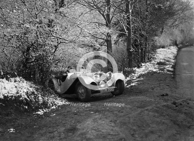 SS Jaguar 100 taking part in a motoring trial, late 1930s. Artist: Bill Brunell.