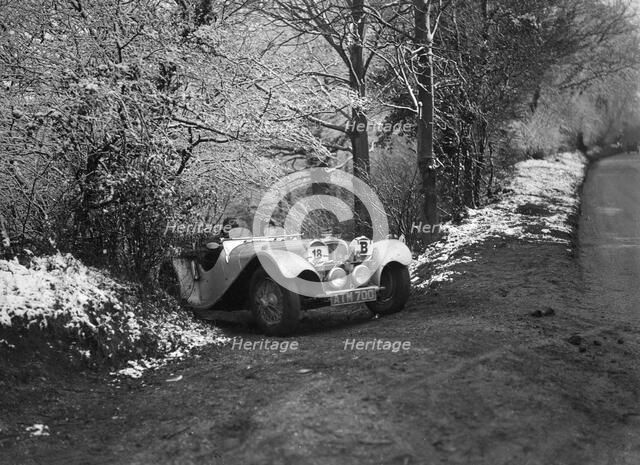 SS Jaguar 100 taking part in a motoring trial, late 1930s. Artist: Bill Brunell.