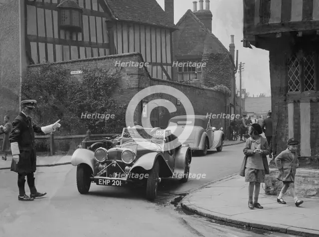 SS Jaguar 100 of SH Newsome competing in the RAC Rally, 1939. Artist: Bill Brunell.