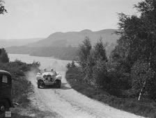SS Jaguar 100 open 2-seater of Miss E Violet Watson competing in the RSAC Scottish Rally, 1939. Artist: Bill Brunell