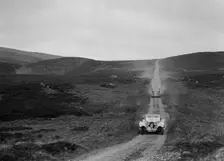 SS Jaguar 100 open 2-seater and Humber saloon competing in the RSAC Scottish Rally, 1939. Artist: Bill Brunell