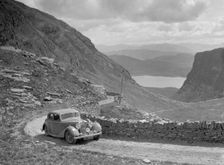 SS Jaguar of CL Bembridge competing in the RSAC Scottish Rally, 1936. Artist: Bill Brunell