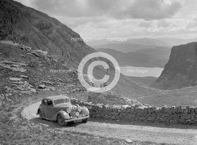 SS Jaguar of CL Bembridge competing in the RSAC Scottish Rally, 1936. Artist: Bill Brunell.