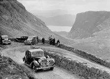 SS Jaguar saloon of DS Hand competing in the RSAC Scottish Rally, 1936. Artist: Bill Brunell