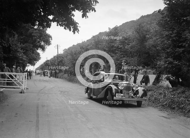 SS Stanley's Jaguar SS competing at the MCC Torquay Rally, July 1937. Artist: Bill Brunell.