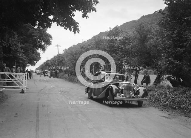 SS Stanley's Jaguar SS competing at the MCC Torquay Rally, July 1937. Artist: Bill Brunell.