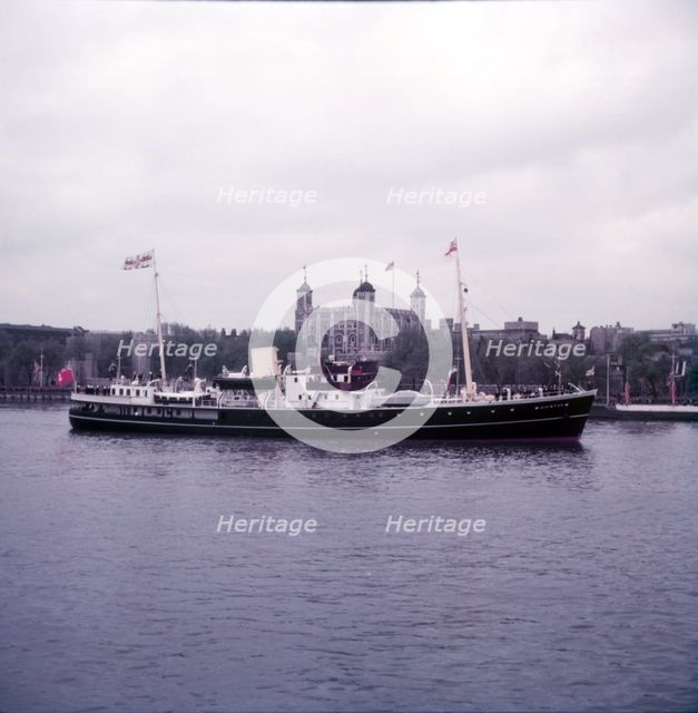 SS Patricia passing the Tower of London, c1953. Creator: Arthur Charles Kirby Ware.