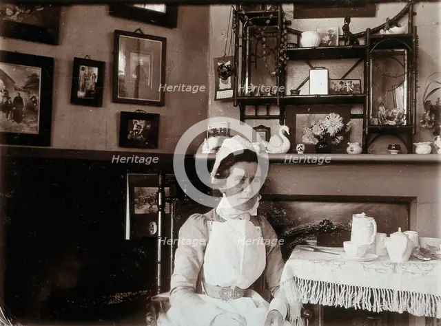 St Bartholomew's Hospital, London: a nurse taking tea, c1890. Creator: Unknown.
