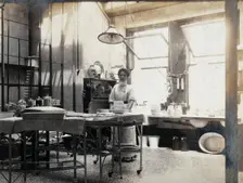St Bartholomew's Hospital, London: nurse in operating theatre, c1890. Creator: Unknown