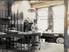 St Bartholomew's Hospital, London: nurse in operating theatre, c1890. Creator: Unknown