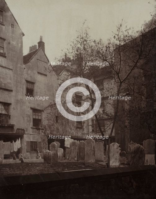 St. Bartholomews: The Churchyard Looking towards Cloth Fair, 1877. Creator: Alfred H. Bool (British); John Bool (British), and ; album issued by The Society for Photographing the Relics of Old London; Henry Dixon (British (modern), 1820-1893).