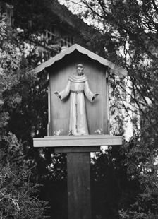 St. Francis statue in garden of Mrs. J.C. Brady, 1931 July 14. Creator: Arnold Genthe