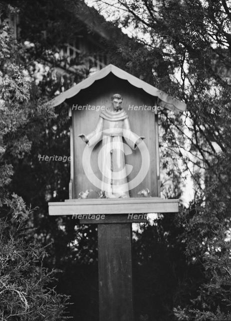 St. Francis statue in garden of Mrs. J.C. Brady, 1931 July 14. Creator: Arnold Genthe.