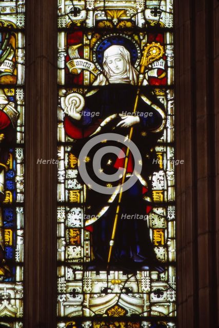 St. Hilda of Whitby holding an ammonite, West window, Hereford Cathedral, 20th century. Artist: CM Dixon.