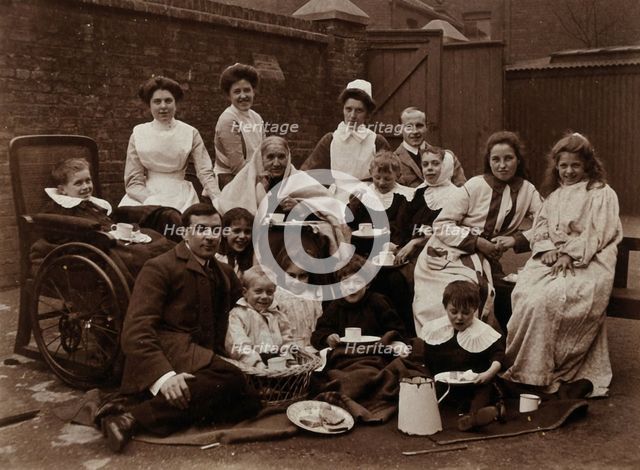 St Mary's Hospital, Plaistow: Basil Hood and Robert Archibald with patients and nurses..., 1904. Creator: Unknown.