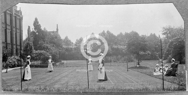 St Marylebone Infirmary, London: nurses playing tennis, 1906 (1912). Creator: Unknown.