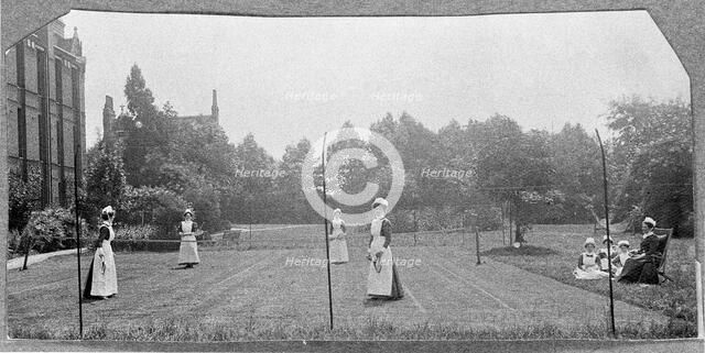 St Marylebone Infirmary, London: nurses playing tennis, 1906 (1912). Creator: Unknown.