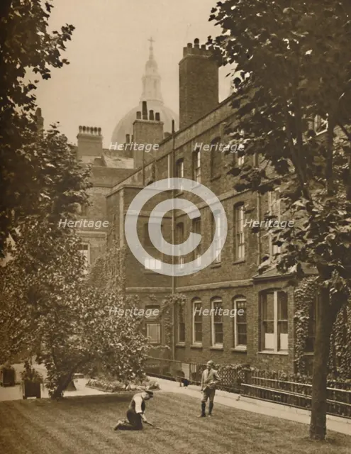 'St. Paul's Dome Brooding Over The Roof-Tops of Amen Court', c1935. Creator: Donald McLeish.