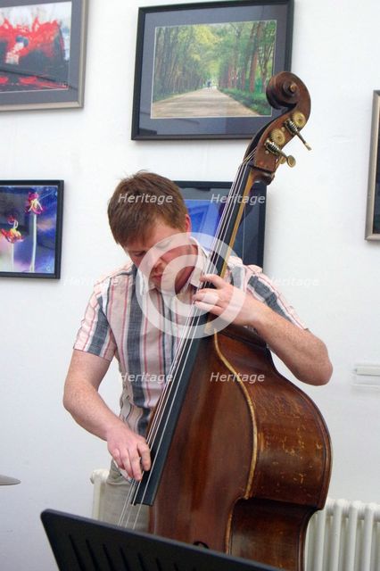 Stuart Barker, Stuart Henderson Quartet, Clocktower Cafe Jazz Club, Croydon, London, April 2025. Creator: Brian O'Connor.