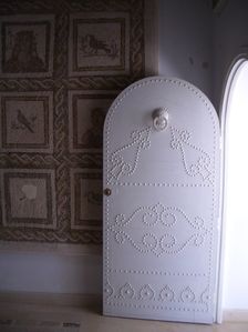 Studded door and mosaic, El Jem Museum, El Djem, Tunisia, 2009. Creator: Amanda Waite