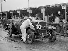 Studebaker of A Hollidge and GAW Laird in the pits at the JCC Double Twelve Race, Brooklands, 1929. Artist: Bill Brunell