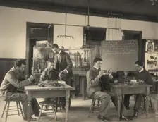 Students constructing telephones at Hampton Institute, 1899 or 1900. Creator: Frances Benjamin Johnston