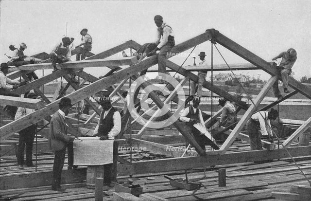 Students framing the roof of a large building, 1904. Creator: Frances Benjamin Johnston.