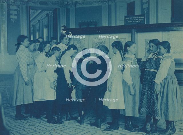 Students from 6th Division public schools, Washington DC, looking at...Library of Congress, (1899?). Creator: Frances Benjamin Johnston.